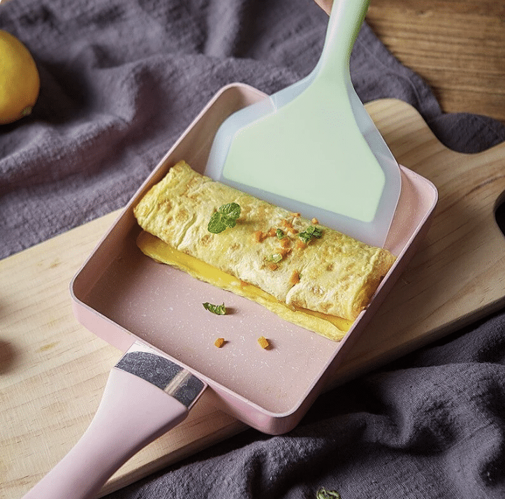 Poêle à Omelette Antiadhésive à Quatre Trous Pour une Cuisson Polyvale