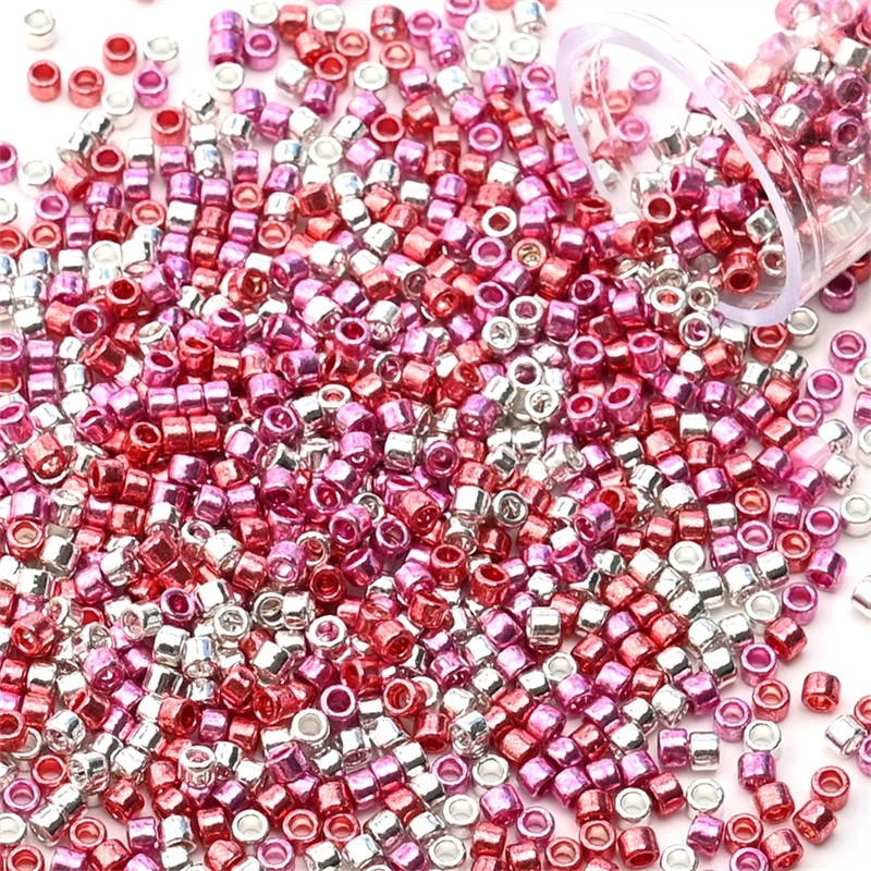 Perles japonaises en verre​ 11/0 métal mix rouge (ø 2 mm)