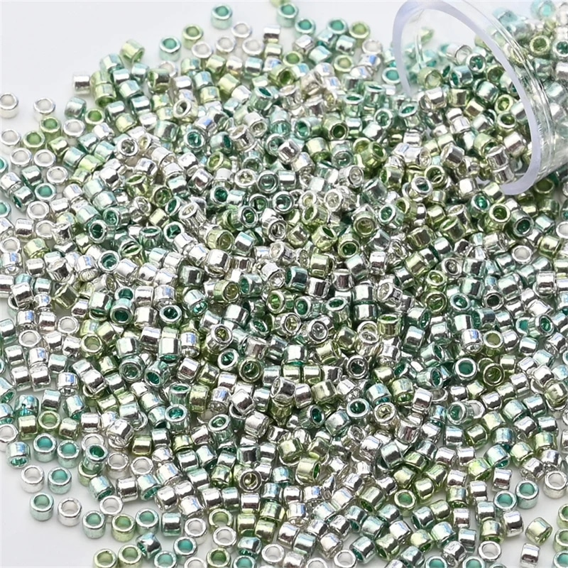 Perles japonaises en verre​ 11/0 métal mix vert (ø 2 mm)