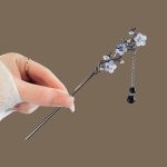Baton pour attacher les cheveux​ cristaux scintillants