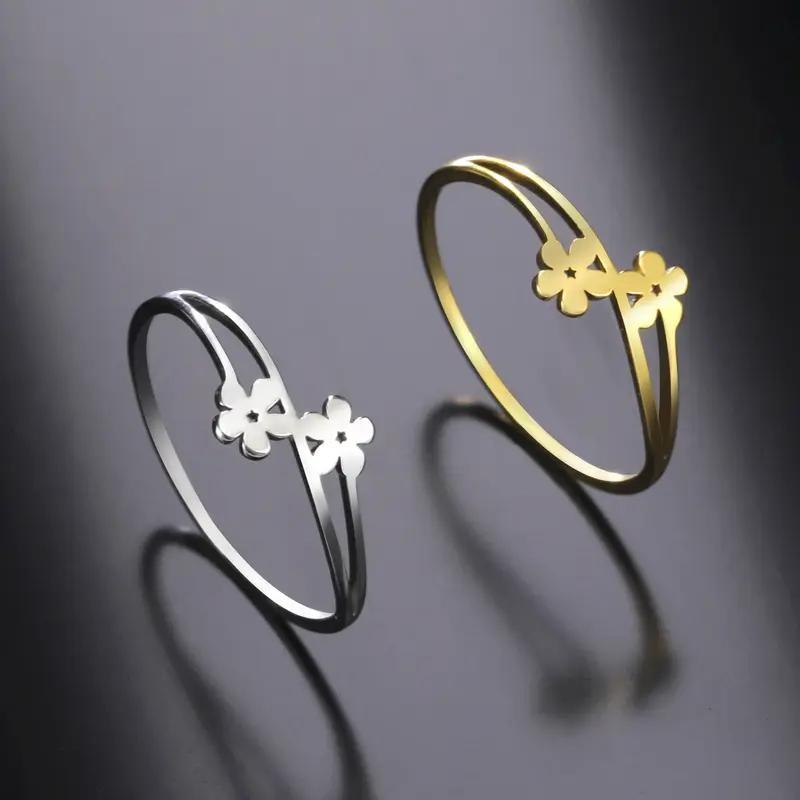 Bague de fleur en argent ajouré avec double anneau
