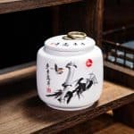 Boîte à thé en céramique à motifs asiatiques et couvercle hermétique - Grues et Calligraphie