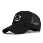 Casquette trucker avec patch brodé à visage souriant - Noir