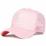 Casquette trucker avec patch brodé et visage souriant - Rose