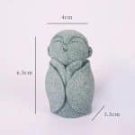 Statuette de moine bouddhiste en résine effet pierre - Moine Enveloppé dans sa Robe