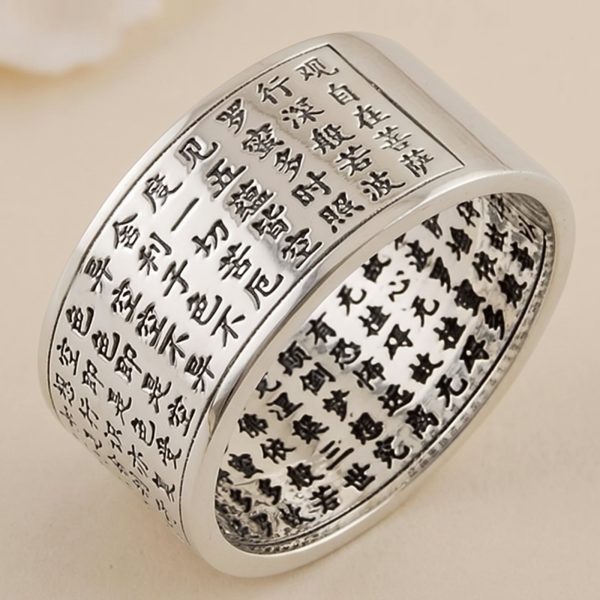 Bague Sutra en argent à calligraphie asiatique gravée