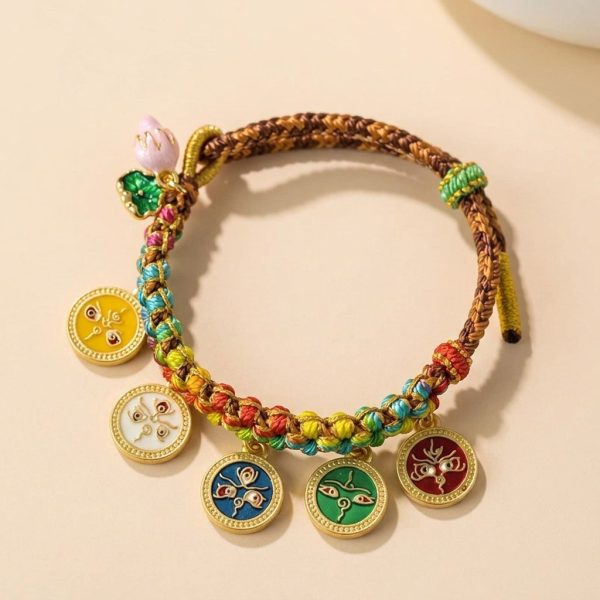 Bracelet porte-bonheur tibétain tressé multicolore à médaillons dorés émaillés