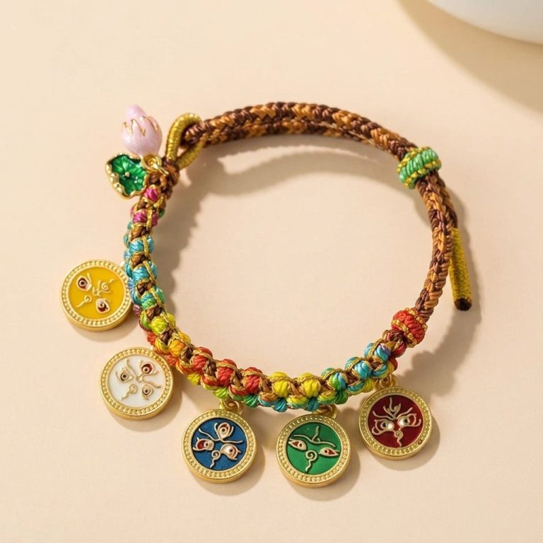Bracelet porte-bonheur tibétain tressé multicolore à médaillons dorés émaillés