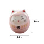 Figurine daruma maneki neko porte-bonheur en céramique émaillée aux motifs dorés