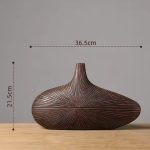 Grand-vase-decoratif-design-en-resine-a-stries-rayonnantes-picture-6