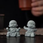 Set de 4 figurines de moines bouddhistes pour décoration zen