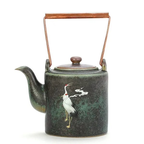Théière japonaise traditionnelle en céramique émaillée à motif de grue blanche et anse en cuivre