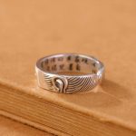 Bague Bouddha en argent ajustable avec cristal et gravure de lotus