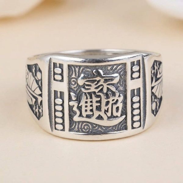 Bague argent pour homme au style asiatique avec gravures en relief ajustable