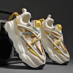 Baskets-streetwear-a-semelle-epaisse-avec-lacets-multicolores-entrecroises-et-tirette-decorative-picture-1