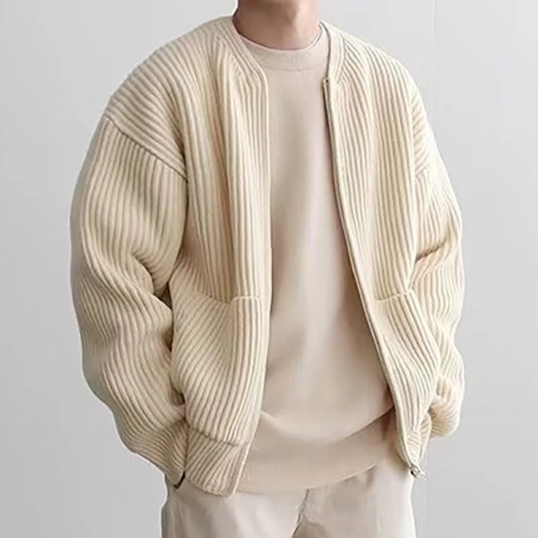 Blouson type bomber en maille côtelée avec fermeture zippée et poches latérales