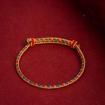 Bracelet tibétain tressé multicolore à nœuds coulissants ajustables en coton