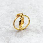 Collier arbre de vie en or avec pendentif pivotant orné de zircones et double anneau