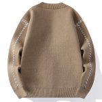 Gros-pull-en-maille-facon-cardigan-a-surpiqures-contrastees-en-diagonale-picture-3