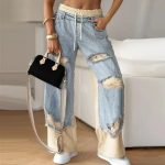 Jean-dechire-femme-a-jambe-droite-avec-larges-dechirures-aux-cuisses-et-ceinture-picture-1