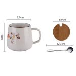 Mug à thé japonais en céramique artisanale avec couvercle en bambou et motifs peints à la main