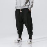 Pantalon-sarouel-leger-a-entrejambe-tombant-et-bas-de-jambes-coteles-picture-4