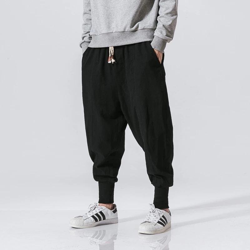 Pantalon-sarouel-leger-a-entrejambe-tombant-et-bas-de-jambes-coteles-picture-4
