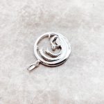 Pendentif rond zircone bleue en argent 925 à motif de vague