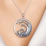 Pendentif rond zircone bleue en argent 925 à motif de vague