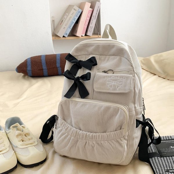 Petit sac à dos femme en velours côtelé avec nœuds décoratifs satinés