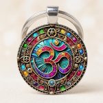 Porte-clé Om en verre bombé avec mandala steampunk et engrenages dorés