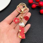 Porte-cles-porte-bonheur-japonais-emaille-a-charms-maneki-neko-picture-10