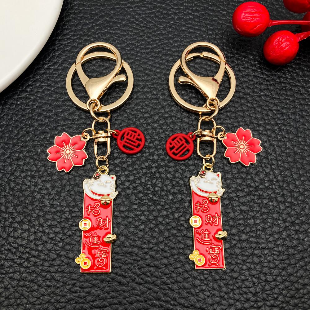 Porte-cles-porte-bonheur-japonais-emaille-a-charms-maneki-neko-picture-2