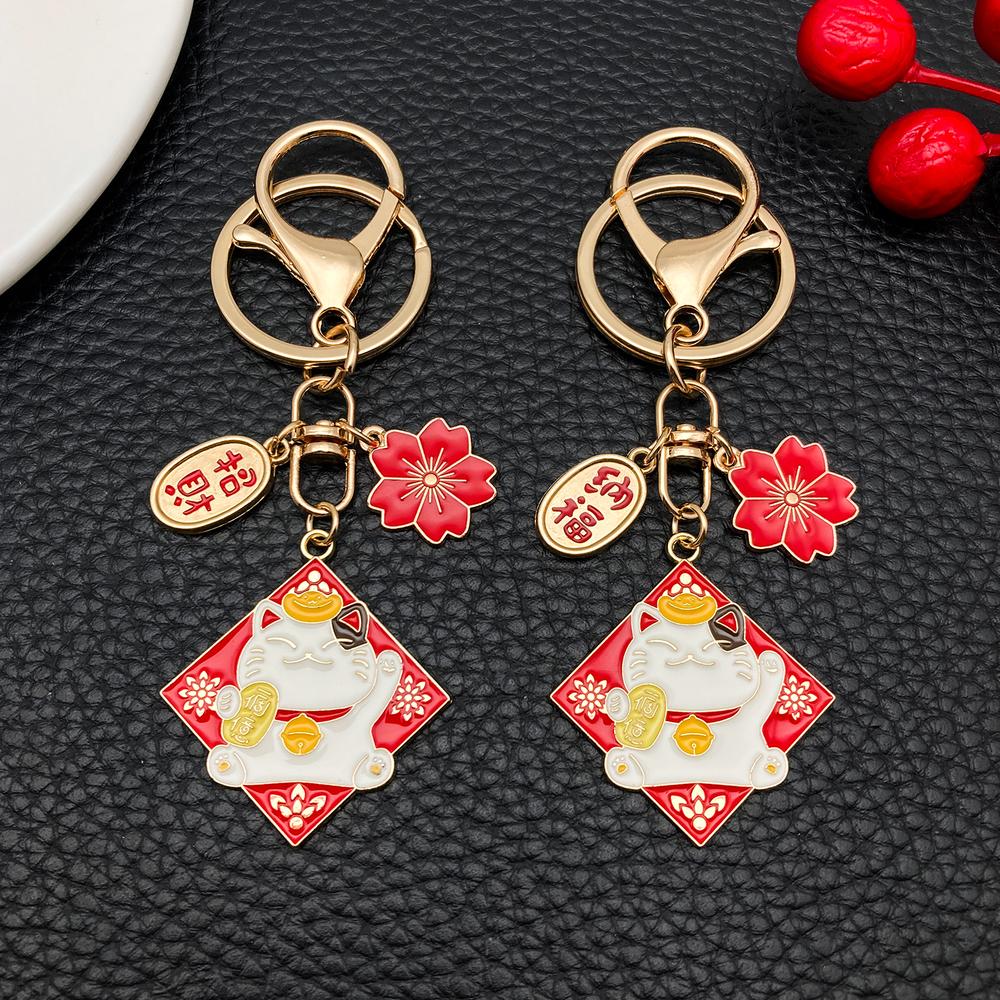 Porte-cles-porte-bonheur-japonais-emaille-a-charms-maneki-neko-picture-3