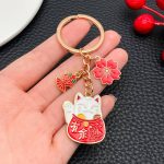 Porte-cles-porte-bonheur-japonais-emaille-a-charms-maneki-neko-picture-4