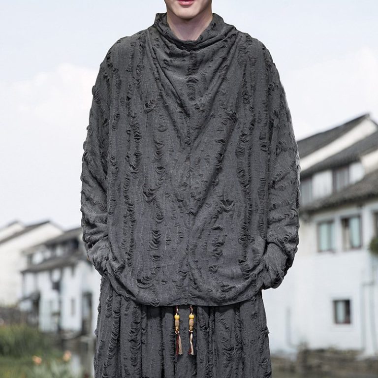 Pull col roulé oversize à effet déchiré style grunge