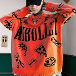 Pull-maille-oversize-streetwear-orne-de-symboles-punk-et-de-finitions-destructur-picture-11