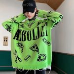 Pull-maille-oversize-streetwear-orne-de-symboles-punk-et-de-finitions-destructur-picture-6