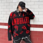 Pull-maille-oversize-streetwear-orne-de-symboles-punk-et-de-finitions-destructur-picture-8