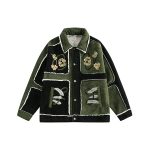 Veste-sherpa-noir-et-vert-kaki-a-broderies-florales-dorees-et-passepoil-blanc-mo-picture-1