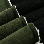 Veste-sherpa-noir-et-vert-kaki-a-broderies-florales-dorees-et-passepoil-blanc-mo-picture-8