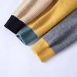 Pull color block femme et homme asymétrique
