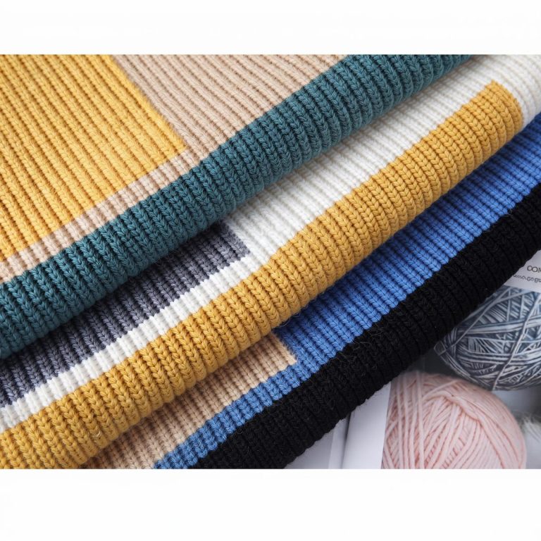Pull color block femme et homme asymétrique